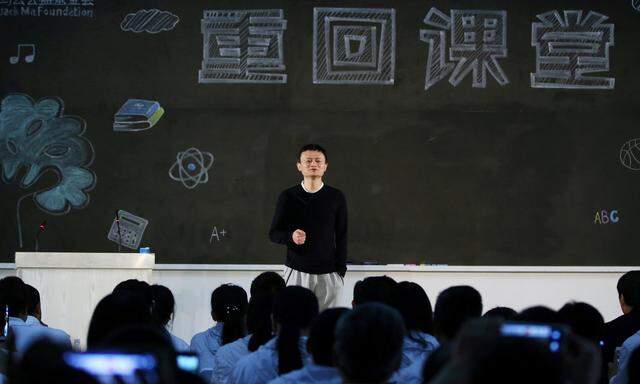 FILE PHOTO: Jack Ma, founder and executive chairman of Alibaba Group, attends an award ceremony for rural teachers organised by the Jack Ma Foundation, in Sanya