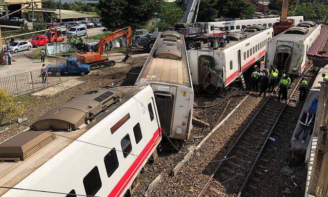 An overturned train is seen in Yilan