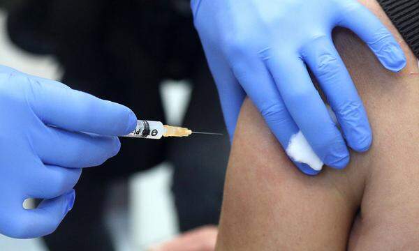 CROATIA COVID-19 VACCINE A medical worker administers a vaccination against the coronavirus disease (COVID-19) with the