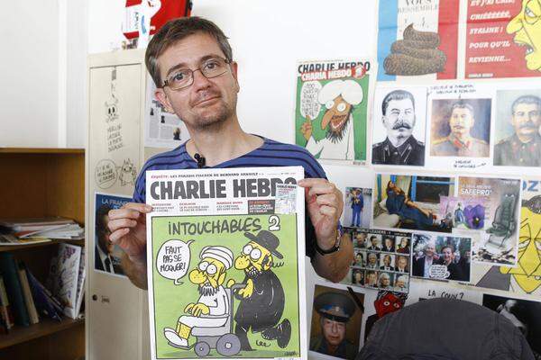 Unter den Toten ist Chefredakteur und Zeichner Stephane Charbonnier, bekannt als "Charb". Auch die bekannten Zeichner Cabu, Wolinski und Tignous sollen zu den Opfern zählen.