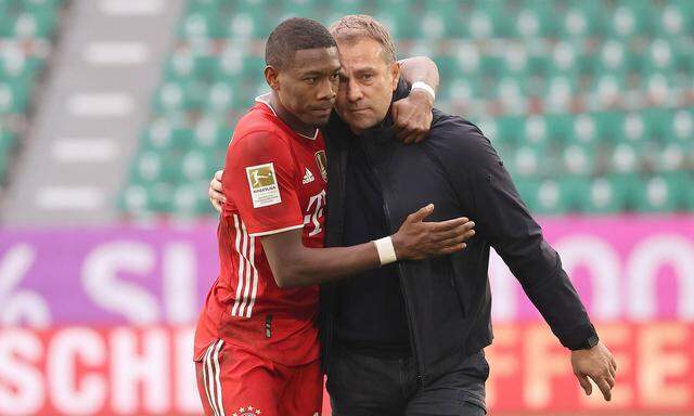 Cheftrainer Hansi Flick (FC Bayern Muenchen) mit David Alaba nach Abpfiff gluecklich DFL REGULATIONS PROHIBIT ANY USE OF