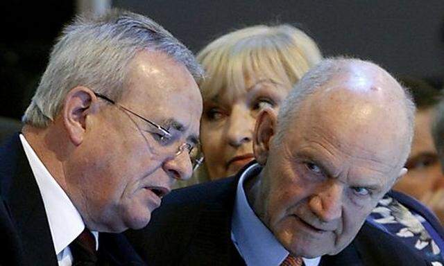 File photo of CEO of Volkswagen Winterkorn talking to chairman of the advisory board Piech as his cou