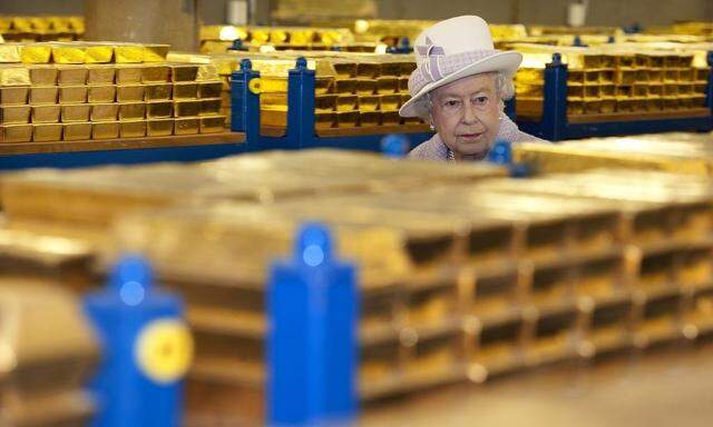Britain's Queen Elizabeth tours a gold vault during a visit to the Bank of England in the City of London