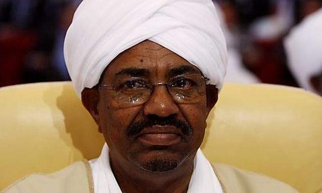 Sudanese President Omar Hassan al-Bashir attends the opening session of the Arab summit in Doha