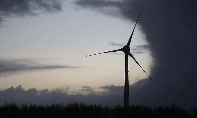 A wind turbine is seen near the North Sea near the town of Emden