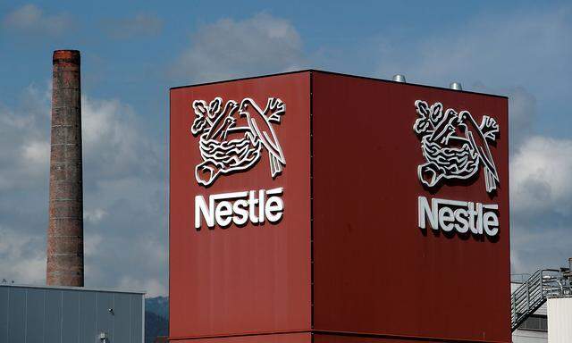 FILE PHOTO: A Nestle logo is pictured on a coffee factory in Orbe