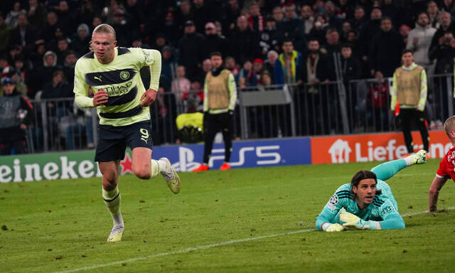 April 19, 2023, Munich, Bavaria, Germany: MATTHIJS DE LIGT and YANN SOMMER can t stop ERLING HAALAND from scoring during