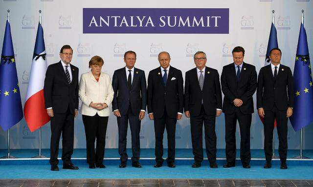 EU leaders observe a minute of silence in memory of the victims of Paris attacks, at the G20 leaders summit in the Mediterranean resort city of Antalya