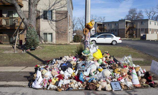 A Christmas tree is seen near a memorial to Michael Brown in Ferguson