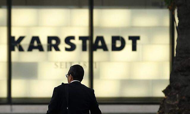 A man arrives at the headquarters of German department store chain Karstadt in Essen
