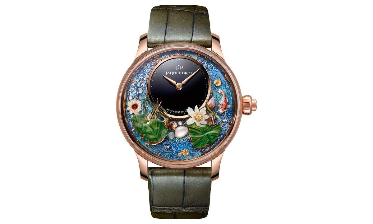 Jaquet Droz „Magic ­Lotus Automation". Dieser neue Automat kann auf Knopfdruck eine mehr als vierminütige Animation zum Besten geben. Dabei dreht sich ein Teich um das Onyx-Zifferblatt, ein Koi taucht auf und ab, Blüten wechseln die Farbe, und die schwebende Libelle lässt sich gegen Ende der Gangreserve auf einem Lotusblatt nieder. Die Entwicklung des Uhrwerks, das mehr als 500 Komponenten umfasst, nahm mehr als drei ­Jahre in Anspruch.