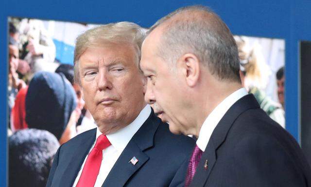 FILE PHOTO: Trump speaks to Erdogan at NATO summit in July