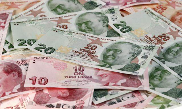 Turkish Lira banknotes are seen in this picture illustration
