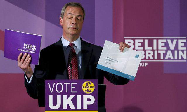 Britain's United Kingdom Independence Party (UKIP) leader Nigel Farage unveils his party's manifesto in Aveley, southeast England