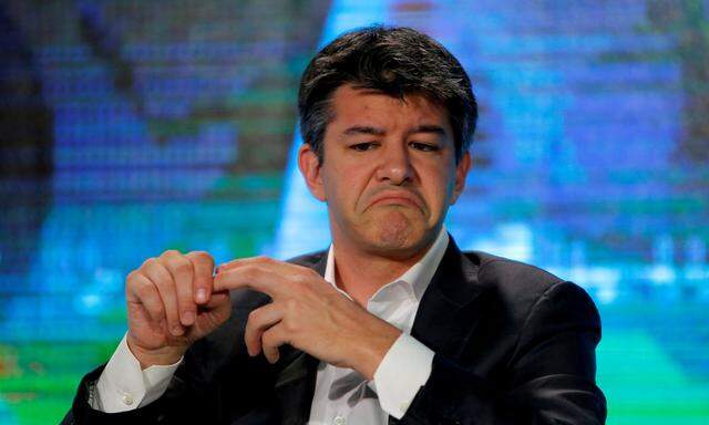 FILE PHOTO - Uber CEO Travis Kalanick attends the summer World Economic Forum in Tianjin