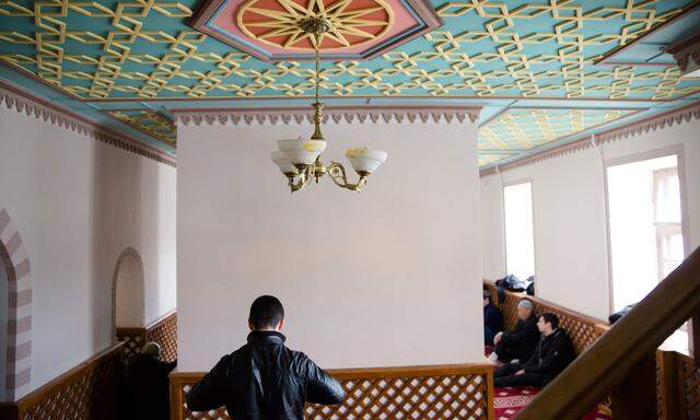 Muslim Tatar man prays in Kebir-Dzhami mosque in old town of Simferopol