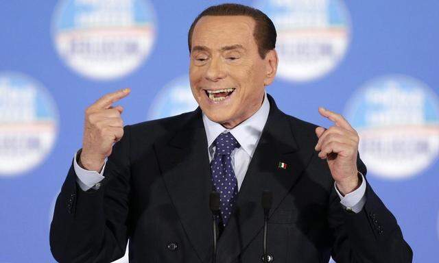 Former Italian prime minister Silvio Berlusconi speaks during a political rally in downtown Rome