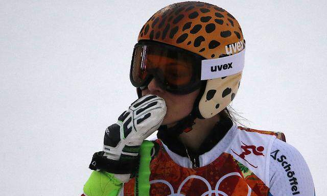 Austria´s Fenninger blows a kiss to a television camera in the finish area after competing in the first run of the women´s alpine skiing giant slalom event during the 2014 Sochi Winter Olympics at the Rosa Khutor Alpine Center