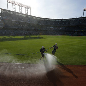 Grounds crew prepare the field ahead of the semi-final World Baseball Classic game between Japan and Puerto Rico in San Francisco