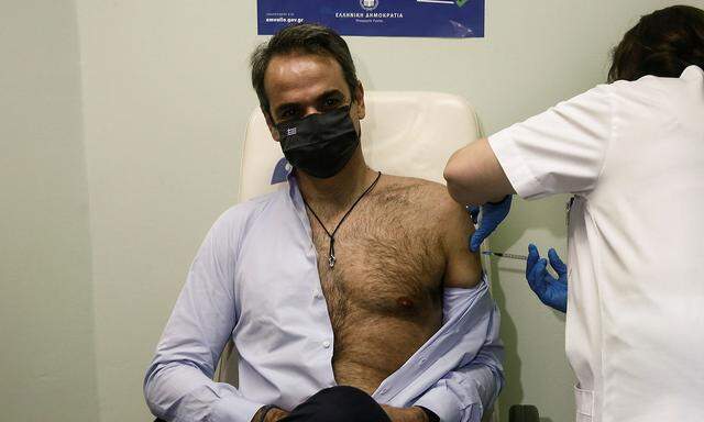 Greek PM Mitsotakis receives the second dose of a vaccine against coronavirus disease (COVID-19)