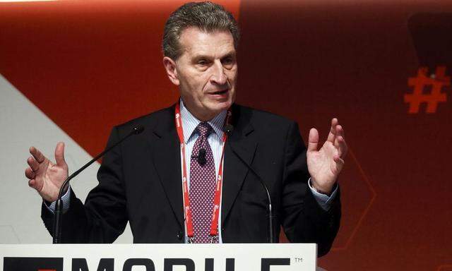 Gunther Oettinger, European Commissioner of Digital Science and Society, delivers a keynote speech at the Mobile World Congress in Barcelona