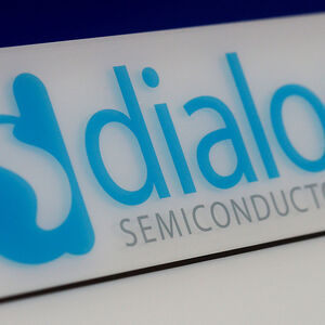 FILE PHOTO: Dialog semiconductor logo is pictured on a building in Germering, Germany