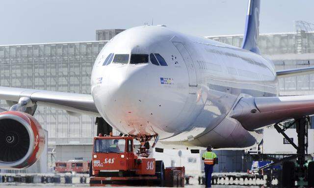 SAS Airbus 330-300 aircraft is prepared for a flight to the U.S. at the Stockholm-Arlanda Airport in Sweden