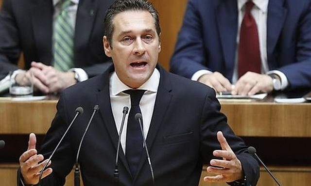 Head of Austrias Freedom Party Strache delivers a speech during an extraordinary session of the Parls Freedom Party Strache delivers a speech during an extraordinary session of the Parl