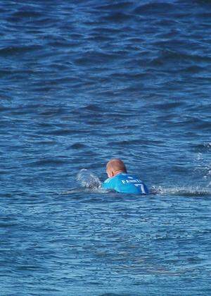 Mick Fanning of Australia is attacked by a shark during the finals of the J-Bay Open in Jeffrey's Bay