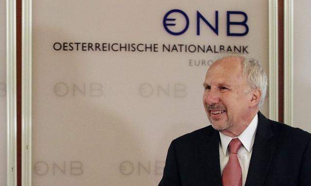 IMF mission head Bakker and Austrian National Bank Governor Nowotny arrive for a news conference in Vienna