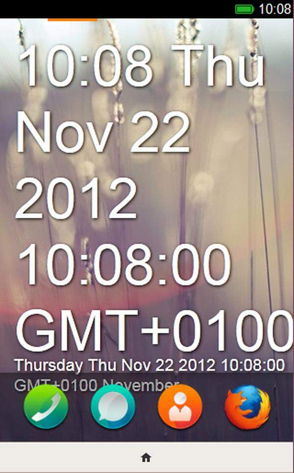 Der Startbildschirm zeigt im Hintergrund Datum und Uhrzeit - tippt man darauf, öffnet sich die Uhr/Wecker-App. Am unteren Rand finden sich - ähnlich wie bei Android - vier Shortcuts zu den wichtigsten Funktionen. In Brasilien sollen 2013 die ersten Geräte mit Firefox OS auf den Markt kommen.