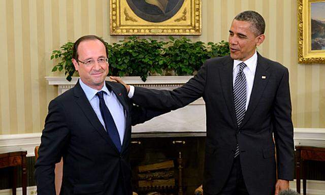 Frankreichs neuer Präsident Hollande (li.) bei US-Präsident Obama.