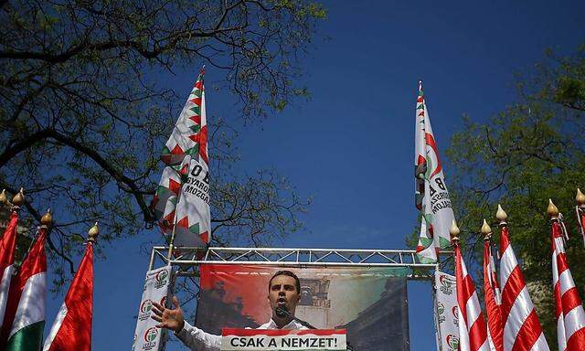 Vona, chairman of Jobbik party, delivers a speech to hundreds of far-right supporters during a rally against the World Jewish Congress Plenary Assembly in Budapest