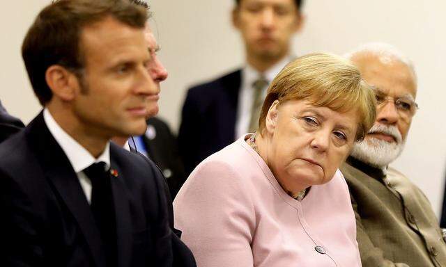 "Wir haben bis zur letzten Minute zu den Fragen verhandelt, die sich mit dem Klimaschutz, Handel und Migration befassen", sagte Merkel. "