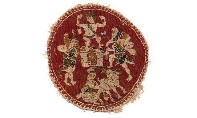 Keltern als lustvoller Kult: ein circa 1600 Jahre altes textiles Medaillon aus Ägypten.