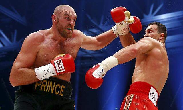 File photo shows Tyson Fury in action against Wladimir Klitschko during their WBA, IBF & WBO Heavyweight Title fight in Dusseldorf