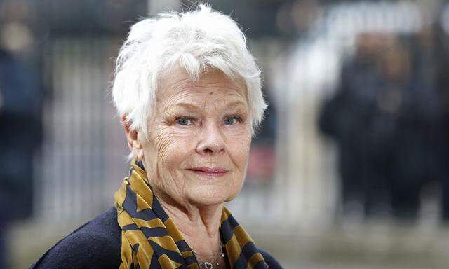 Actress Judi Dench arrives for a memorial service for actor and director Richard Attenborough at Westminster Abbey in London