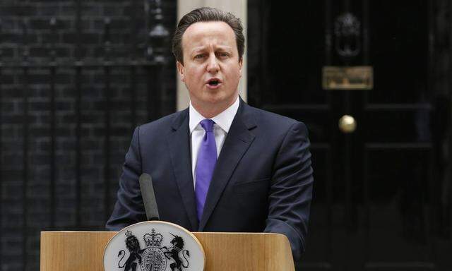 Britain's Prime Minister David Cameron speaks  in front of 10 Downing Street ,about the killing of a British soldier, in London