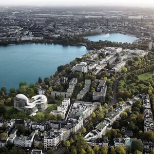 Ungewöhnliche Architektur in ungewöhnlich viel Grünraum.