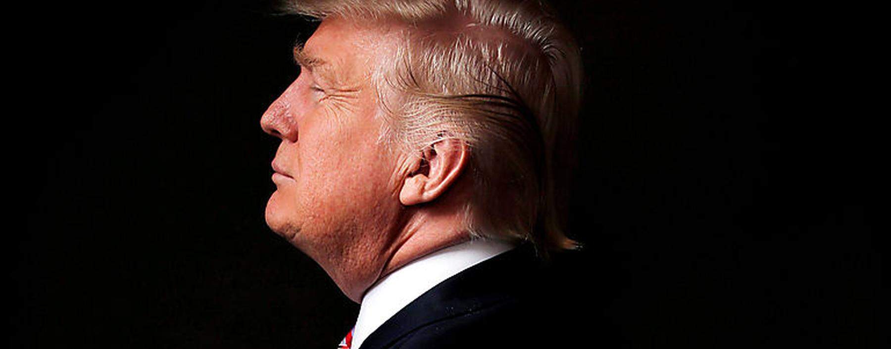 Republican U.S. presidential candidate Donald Trump poses for a photo after an interview with Reuters in his office in Trump Tower, in the Manhattan borough of New York City