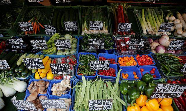 Various vegetables are on display at a shop of a food market in Vienna