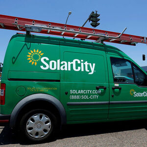 A SolarCity vehicle is seen on the road in San Diego, California