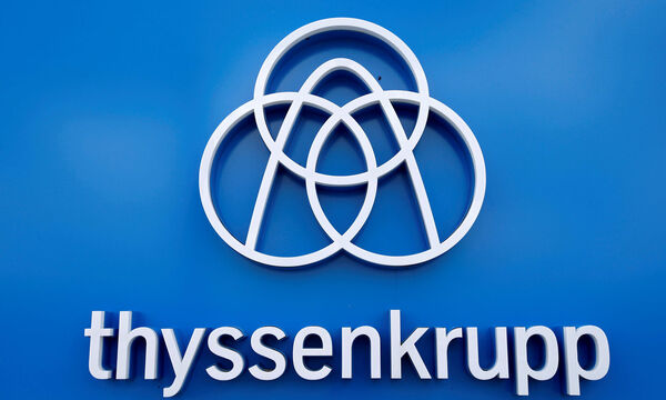 FILE PHOTO: Thyssenkrupp's logo is seen close to the elevator test tower in Rottweil
