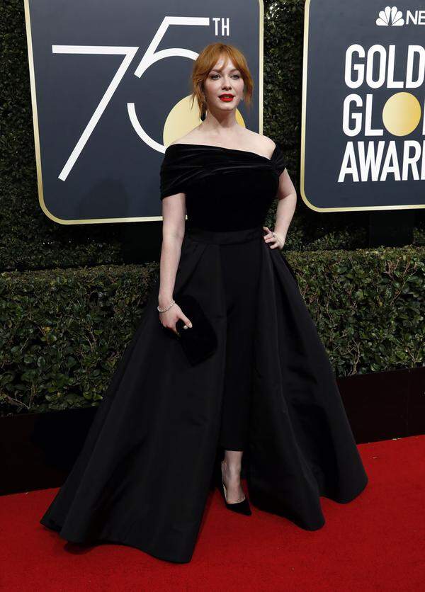 Christina Hendricks v.u.n.o: Stuart Weitzman (Schuhe), Christian Siriano (Anzug), Chopard (Schmuck).