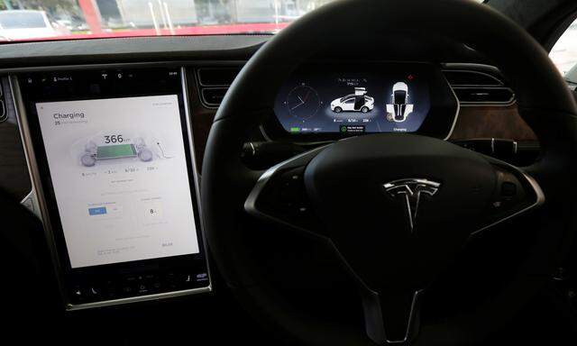 A Tesla Model X car´s touchscreen and instrument panel is photographed at a Tesla electric car dealership in Sydney