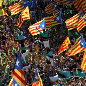 Castellers form a human tower called a ´castell´ as thousands of people gather for a rally on Catalonia´s national day ´La Diada´ in Barcelona