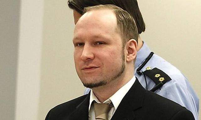 Norwegian mass killer Anders Behring Breivik looks on before being escorted for a 30-minute recess sh