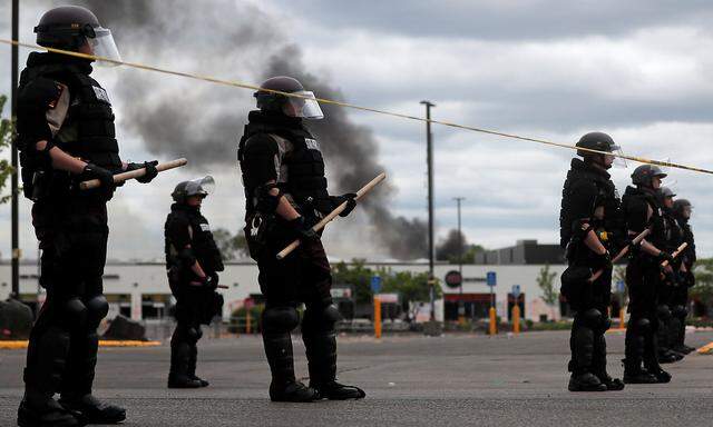 State patrol members guard at the area in the aftermath of a protest against the death in Minneapolis police custody of African-American man George Floyd, in Minneapolis