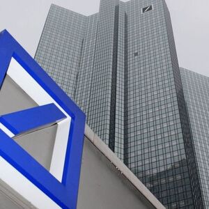 A Deutsche Bank logo is pictured in front of the Deutsche Bank headquarters in Frankfurt