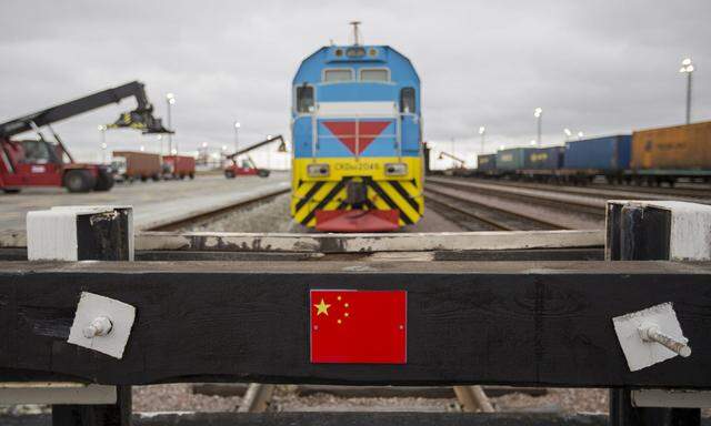 A Chinese flag marking a railway linked to China is seen in front of a train at the Khorgos border crossing point, east of the country´s biggest city and commercial hub Almaty, Kazakhstan